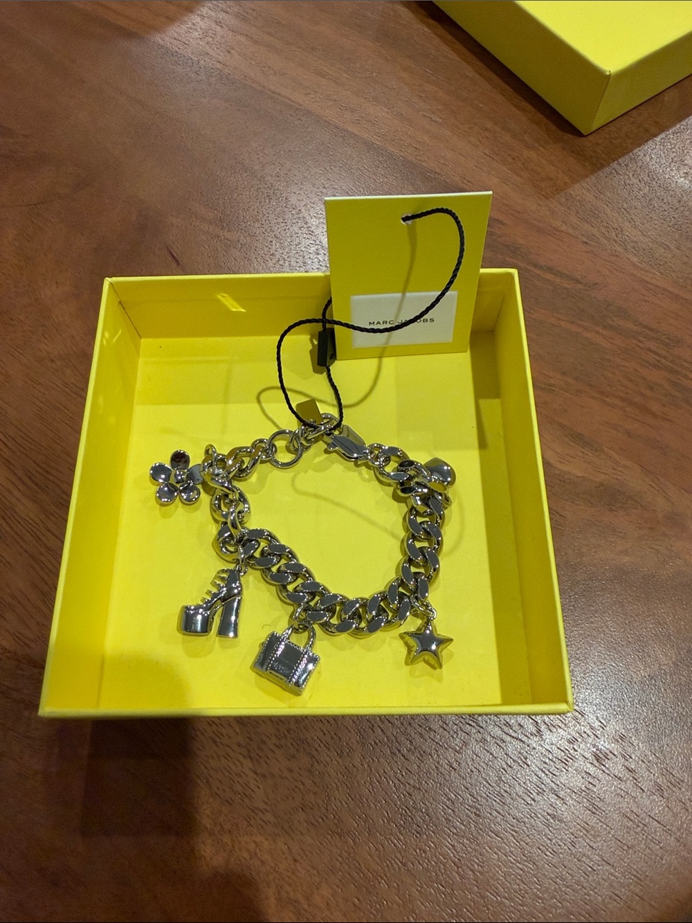 The Mini Icon Charm Bracelet with Star, Shoe & Flower Charms from Marc Jacobs